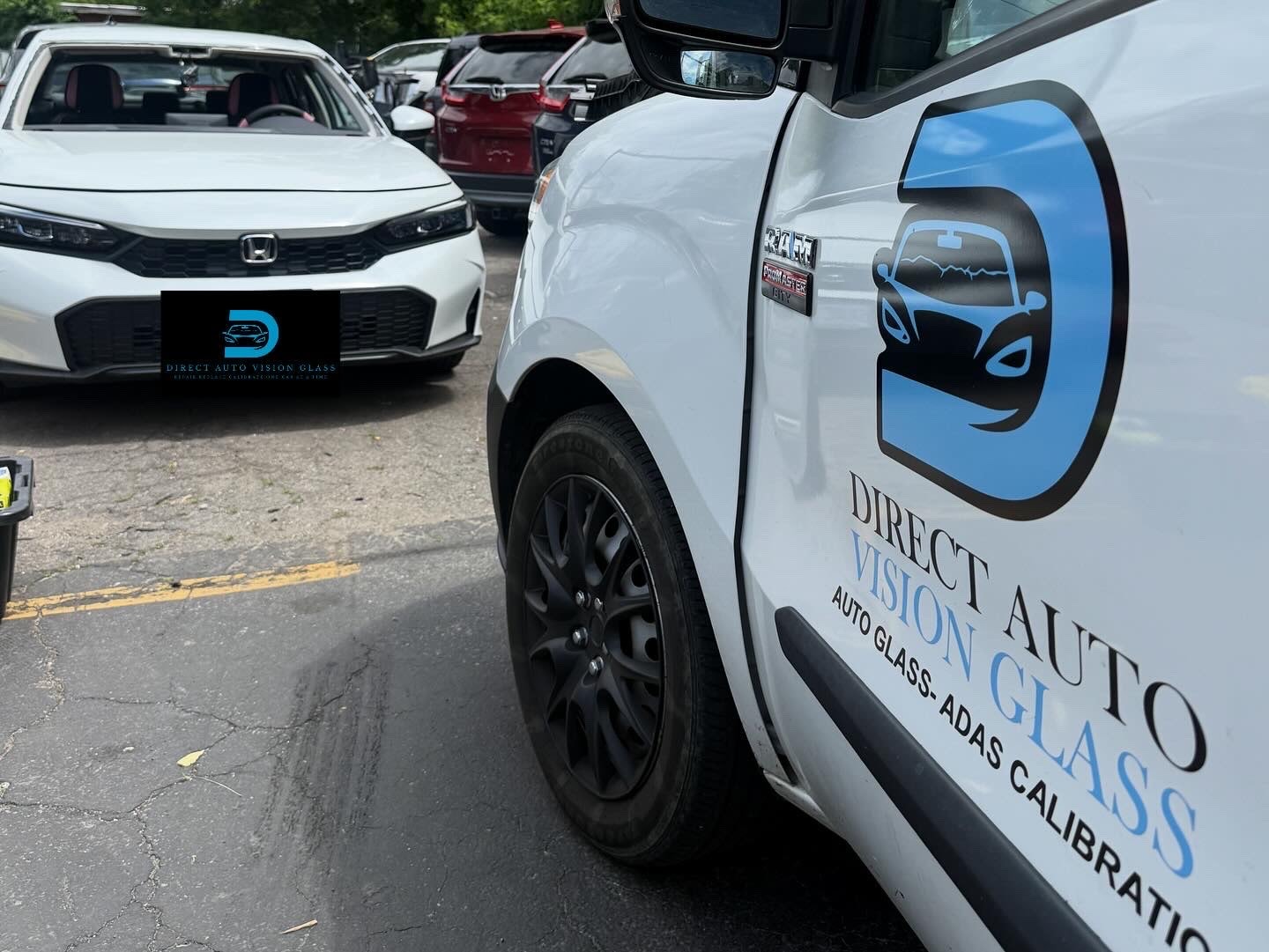 Direct Auto Vision Glass service van alongside a Honda Civic after windshield replacement