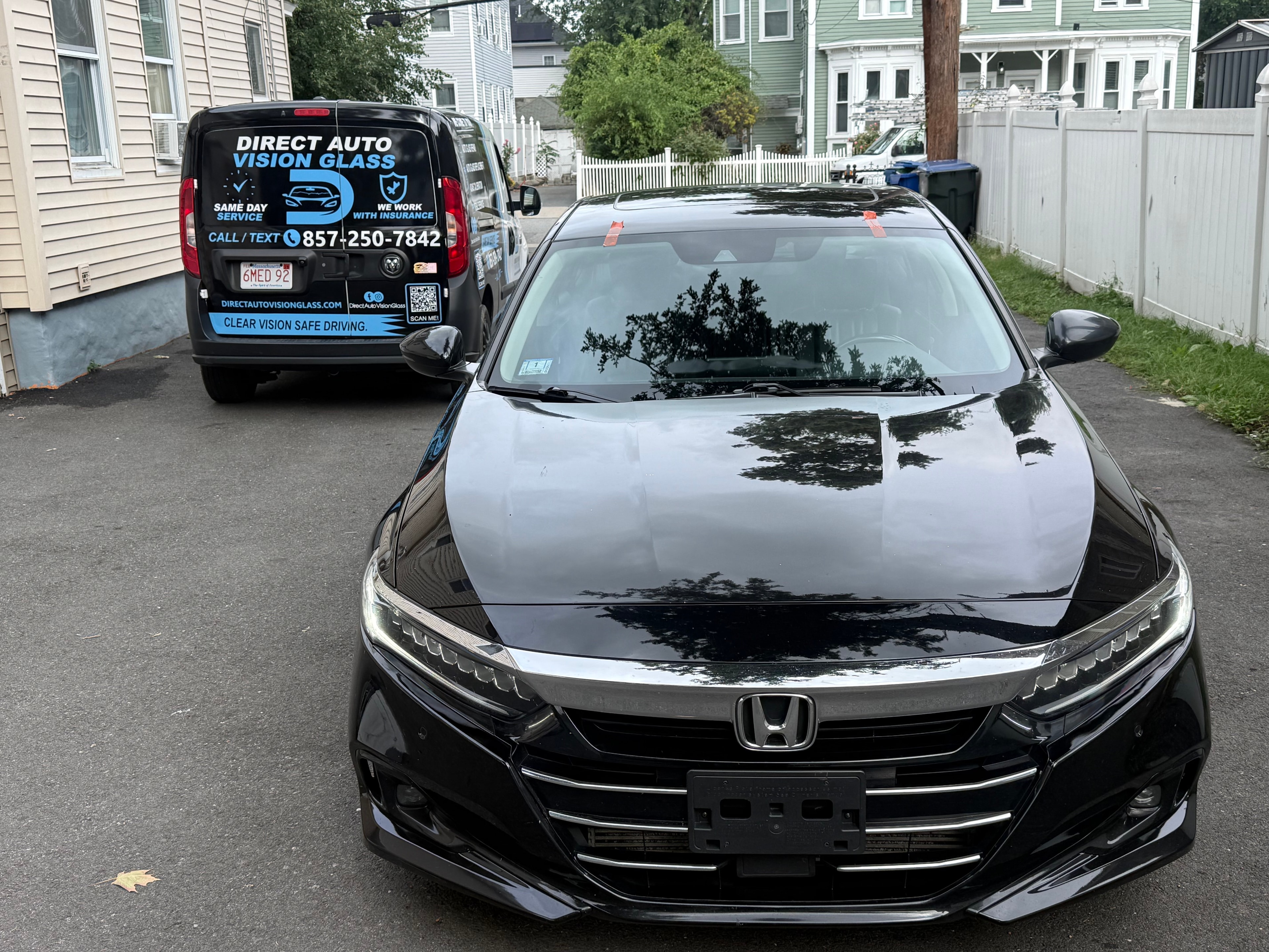 Professional auto glass technician at work